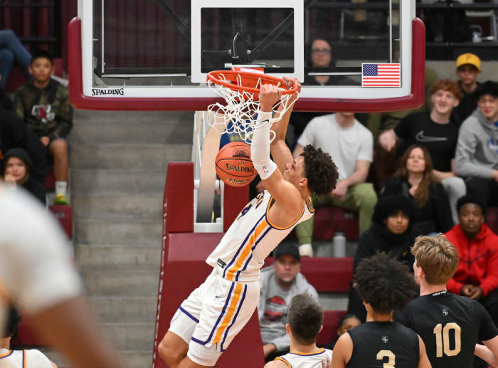 Jasir Rencher with a big slam for Riordan.